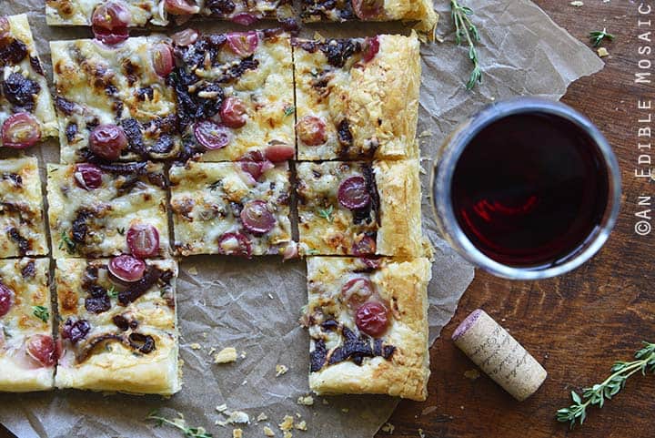 Close Up of Easy Manchego, Grape, and Thyme Flatbread with Red Wine Caramelized Onions