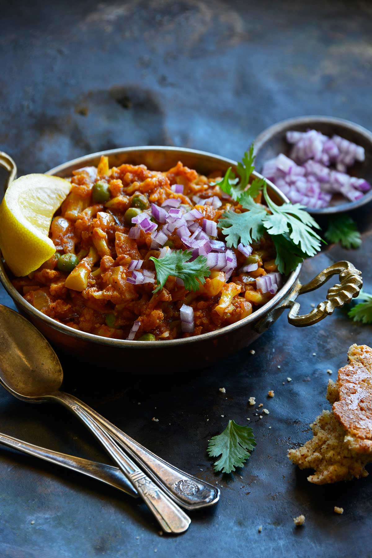 low carb cauliflower Pav Bhaji served in traditional Indian metal bowl