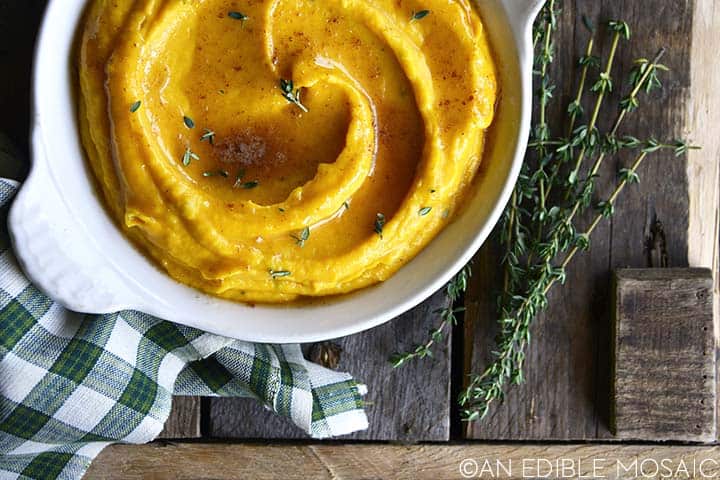 swirls of whipped butternut squash with brown butter drizzle on top