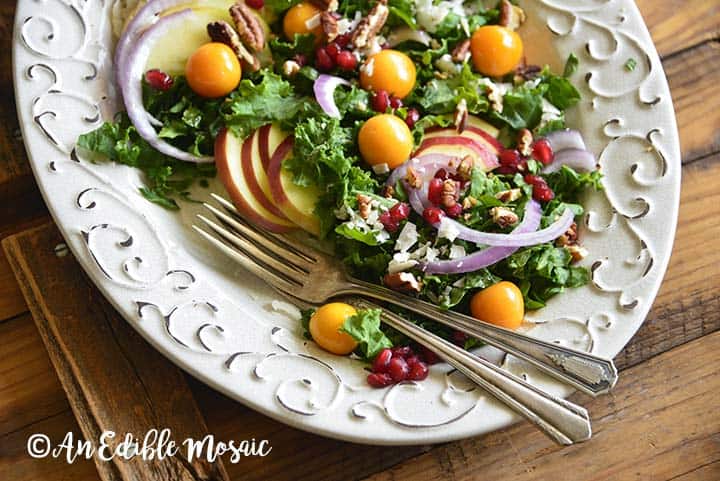 Festive Christmas Salad Recipe on White Platter on Wooden Table