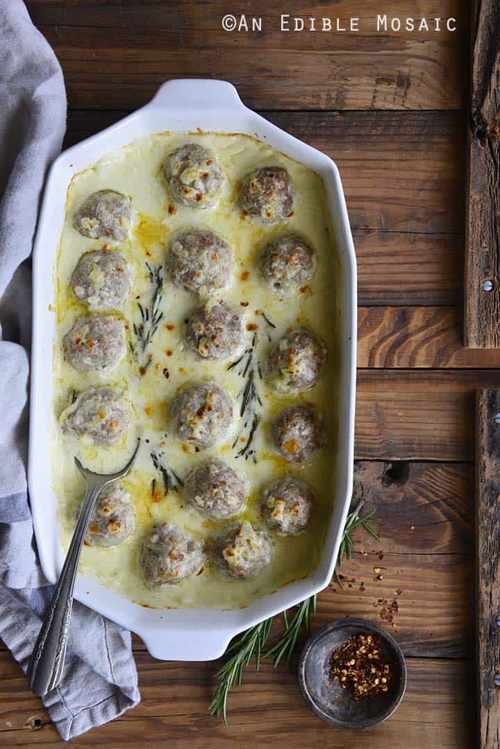 Low Carb Cheesy Turkey Meatballs with Rosemary Cream Sauce in Casserole Dish