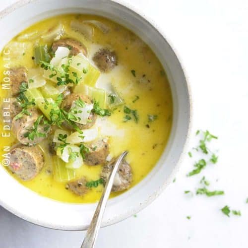 Easy Keto Low Carb Creamy Sausage Soup with Vintage Spoon and Fresh Parsley Garnish