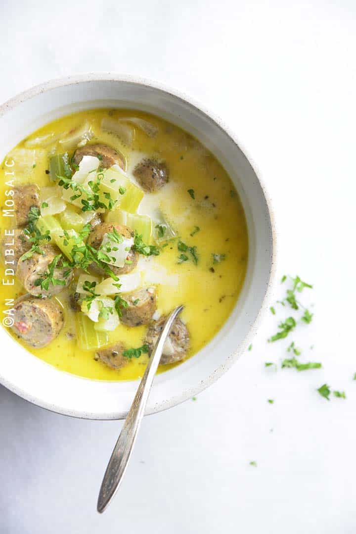 Easy Keto Low Carb Creamy Sausage Soup with Vintage Spoon and Fresh Parsley Garnish