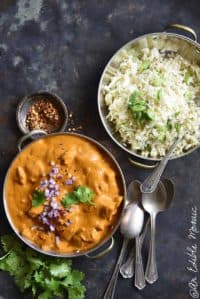 Easy Low Carb Butter Chicken with Bowl of Cauliflower Rice on Metal Background