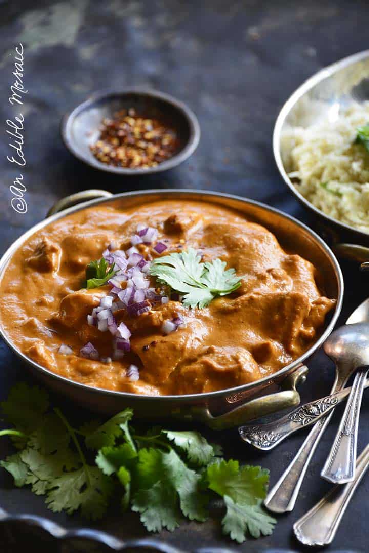 Front View of Easy Low Carb Butter Chicken with Fresh Cilantro in Foreground