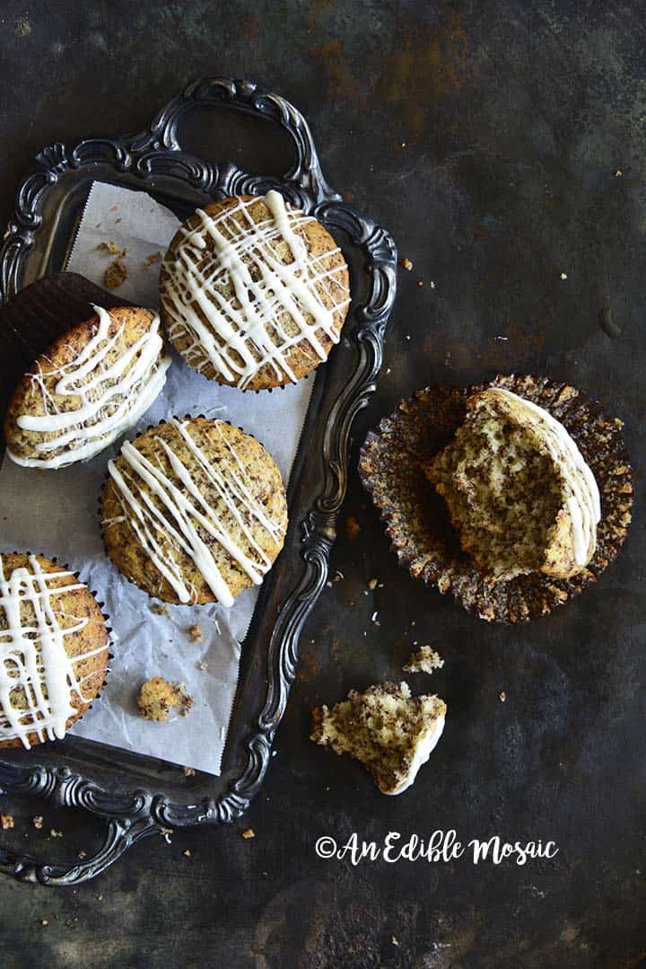 Chocolate Orange Muffins Recipe on Vintage Metal Tray with One Muffin Partially Eaten