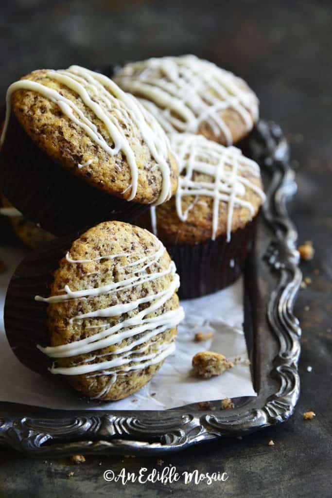 Close Up Front View of Easy Orange Chocolate Cupcakes Showing White Chocolate Drizzle