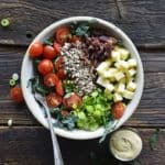 Overhead View of Chopped Kale Salad on Rustic Dark Wood Table