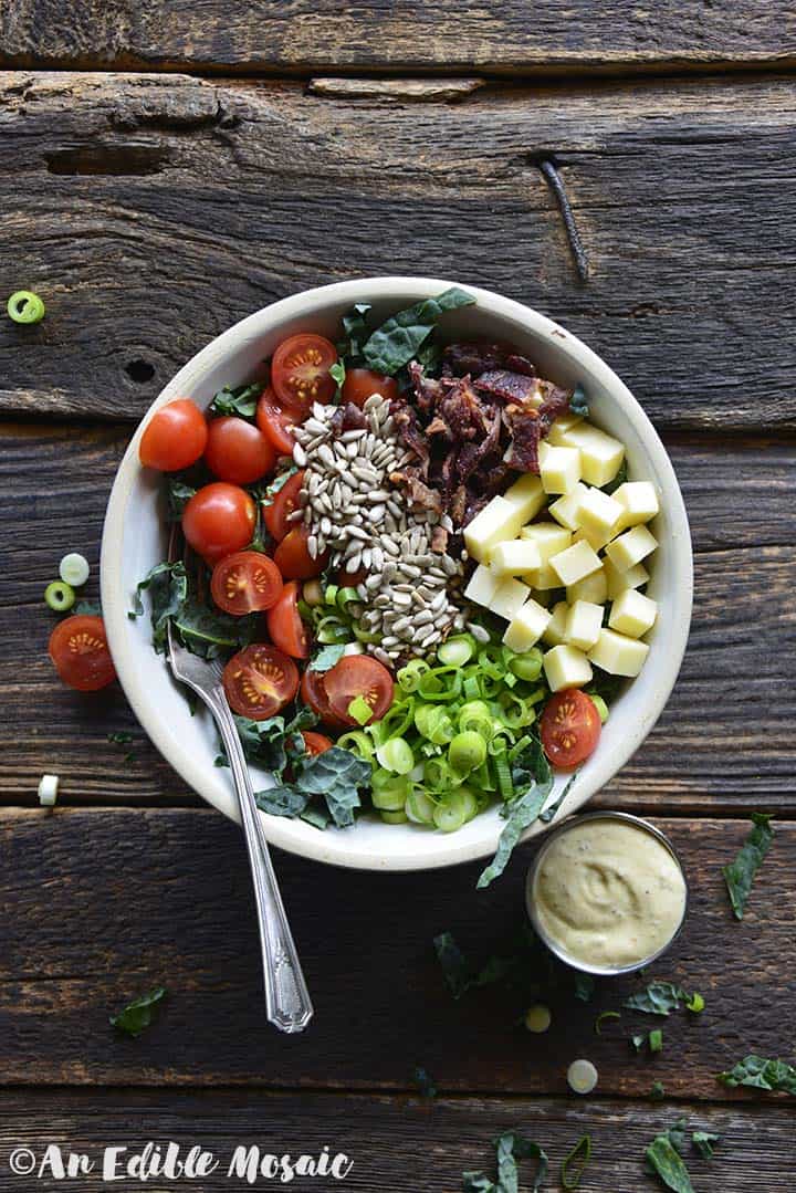 Overhead View of Chopped Kale Salad on Rustic Dark Wood Table