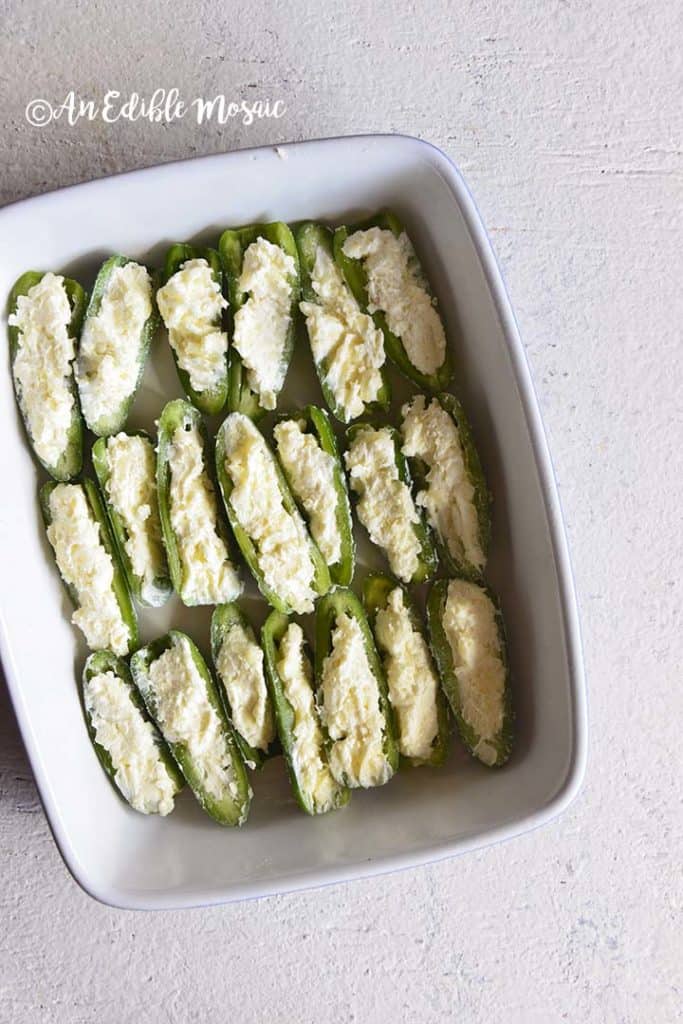Cream Cheese Stuffed Jalapeno Poppers in White Dish