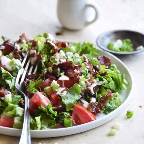 Front View of Bacon Lettuce Tomato Salad with Fork on Plate