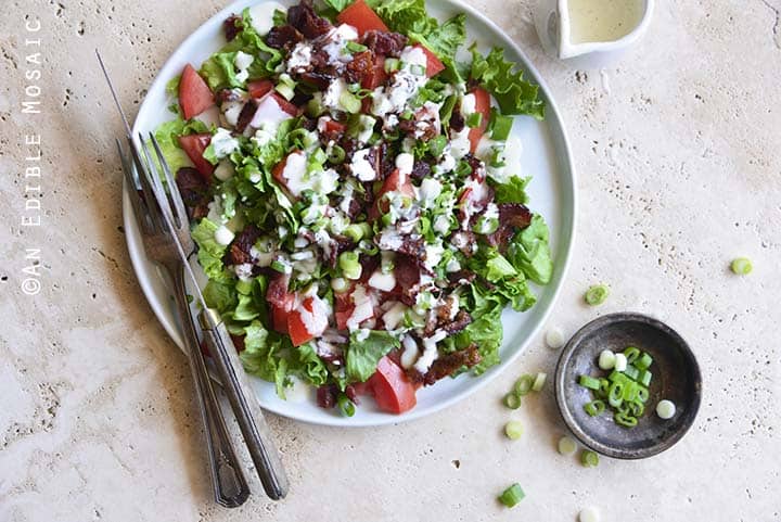 Top View of Healthy BLT Salad with Fork and Knife on Plate