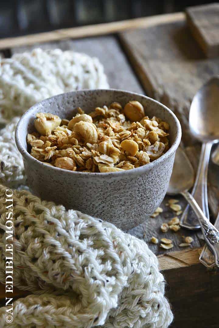 Front View of Healthy Granola Recipe with Cashews and Coconut in White Ceramic Bowl