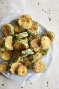 Top View of Keto Crispy Baked Zucchini Slices on Plate