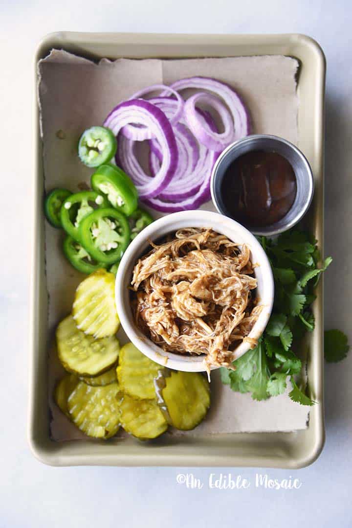 Instant Pot BBQ Chicken on Tray with Pickles Onion and Jalapeno Slices