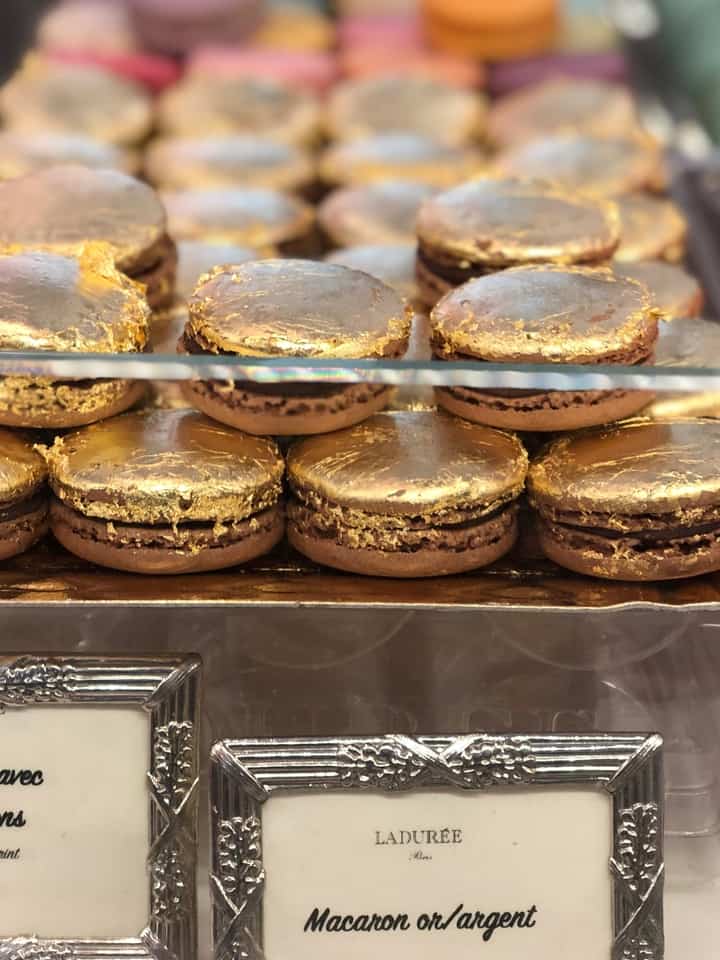 Pile of Gold Macarons at Laduree Paris