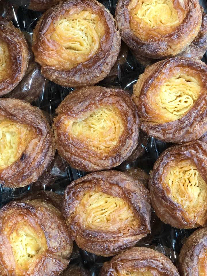 Close Up of Kouign Amann in Bakery Case