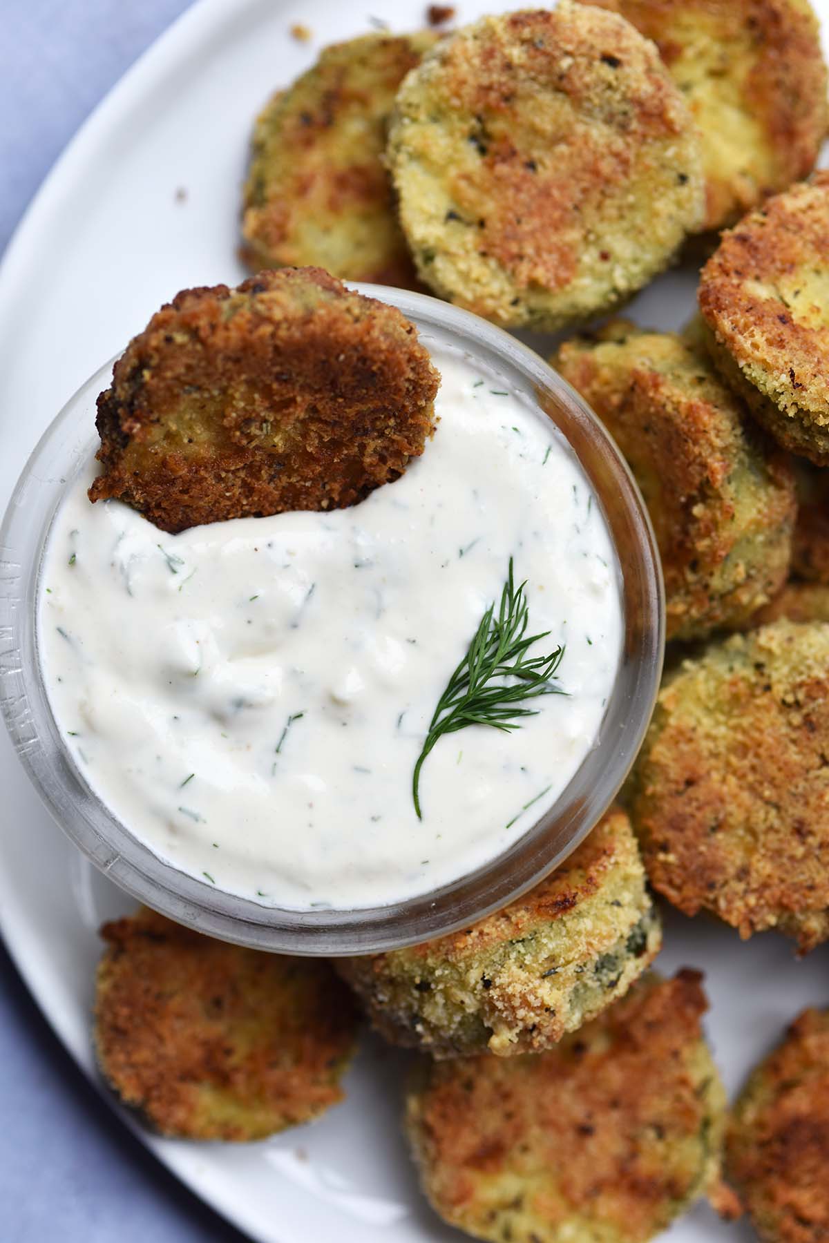 baked zucchini slices recipe served with homemade ranch for dipping