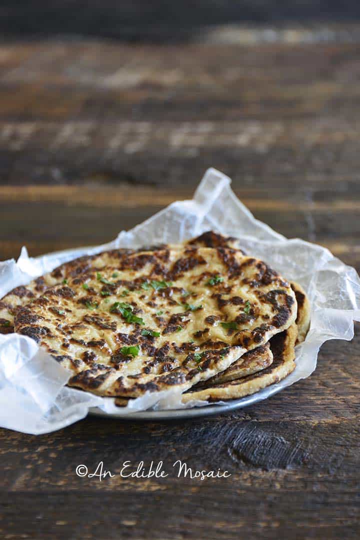 Keto Naan on Platter on Top of Dark Wooden Table