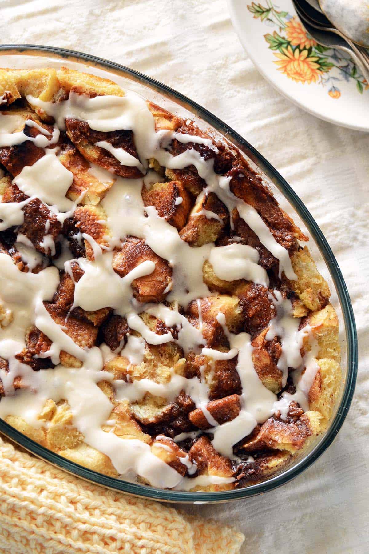 cinnamon bun bread pudding with vanilla icing