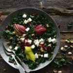 Top View of Bowl of Winter Salad with Vintage Serving Spoons