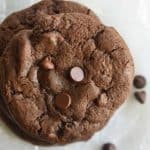 Close Up Top View of Double Chocolate Chip Cookies Recipe on White Wax Paper