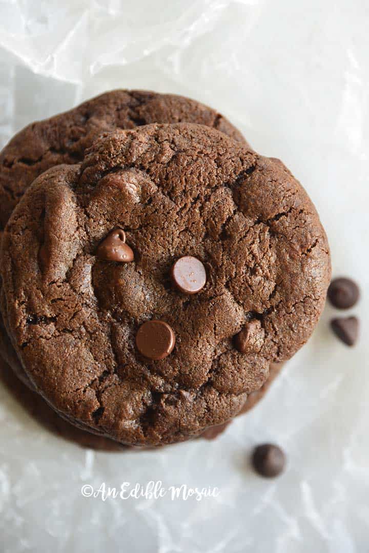 Close Up Top View of Double Chocolate Chip Cookies Recipe on White Wax Paper