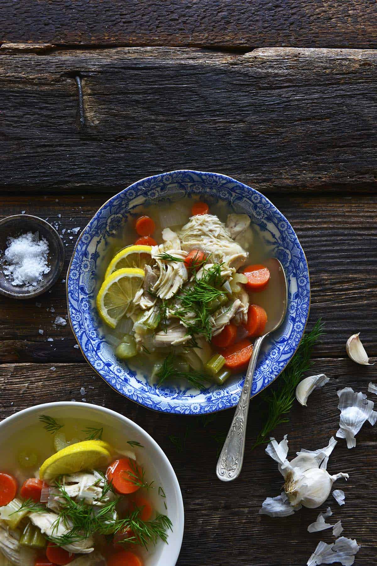 simple chicken soup recipe in bowls on wooden table