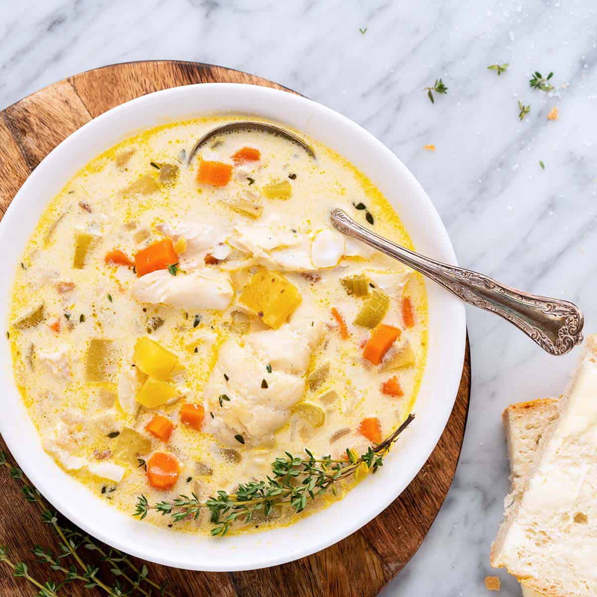 close up top view of bowl of new england fish chowder featured image