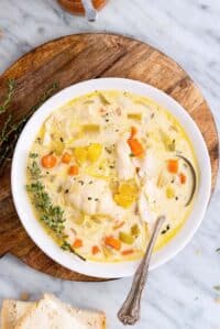cropped-dish-of-new-england-fish-chowder-on-wooden-board-on-marble-counter.jpg