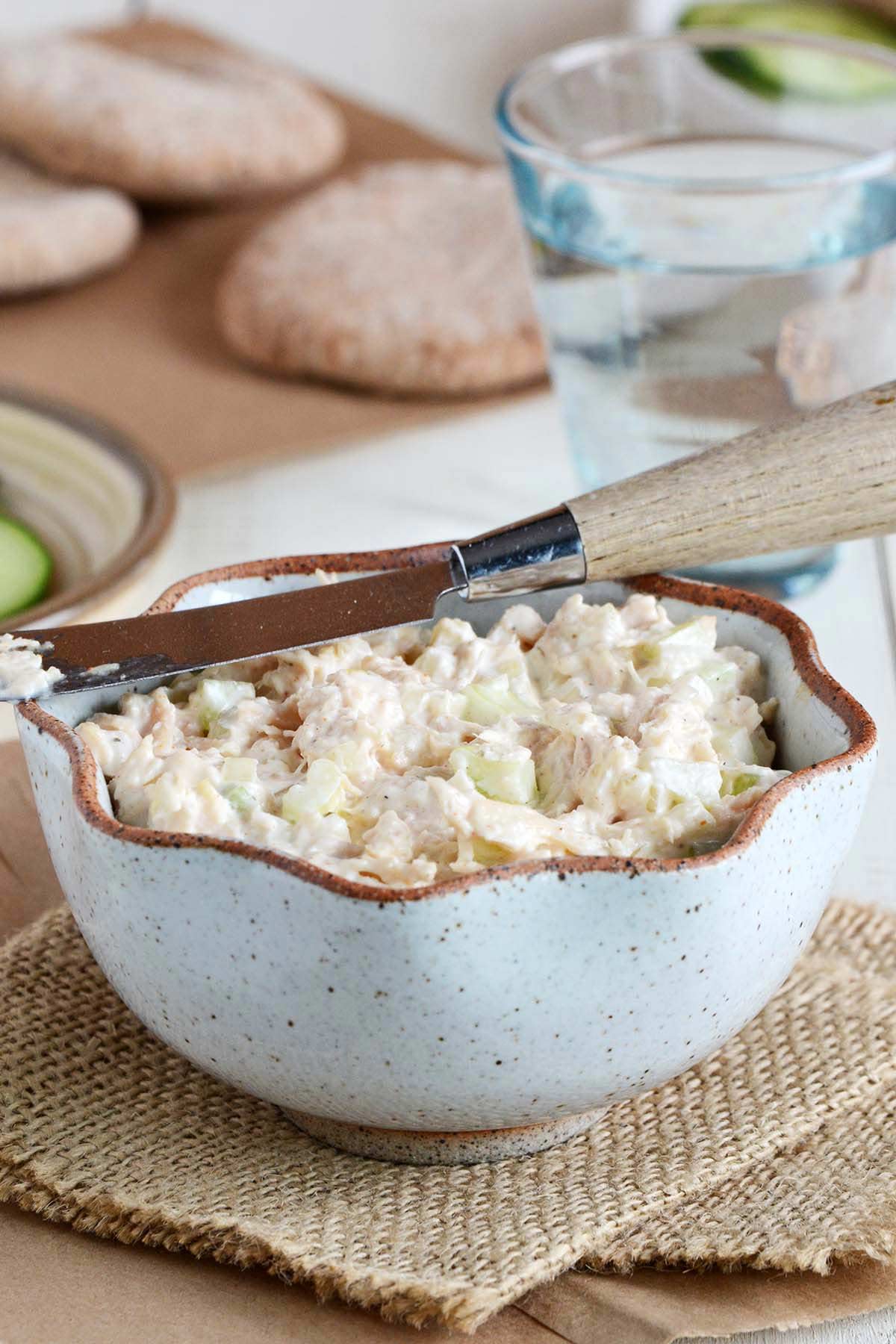 white stoneware bowl with the best canned chicken salad with greek yogurt