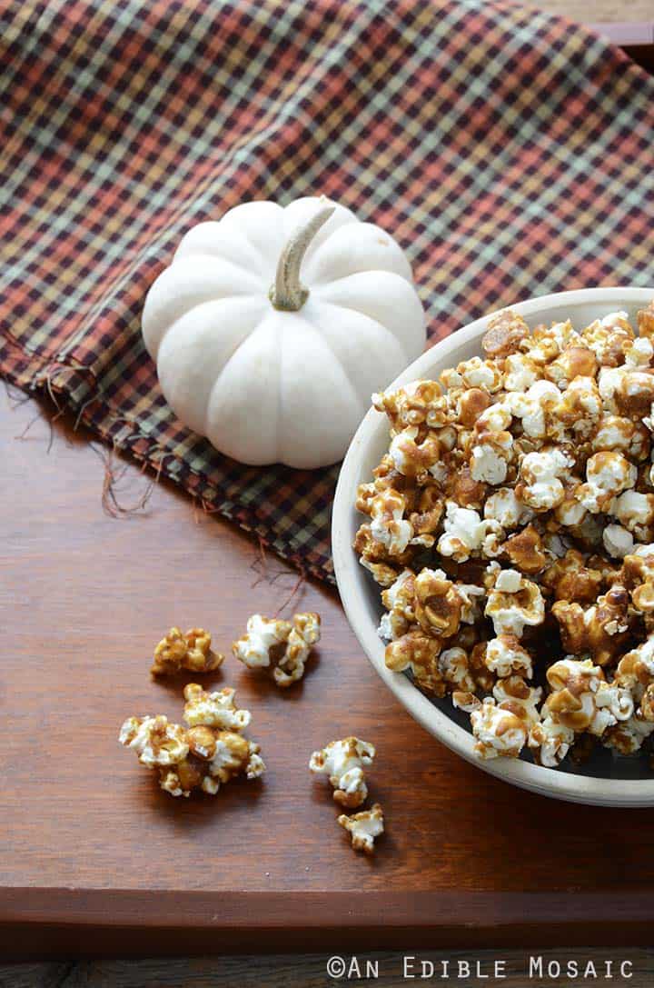 Butterbeer Popcorn with Small White Pumpkin on Wooden Table