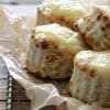 Close Up Front View of Cheese and Thyme Scones on Wooden Table
