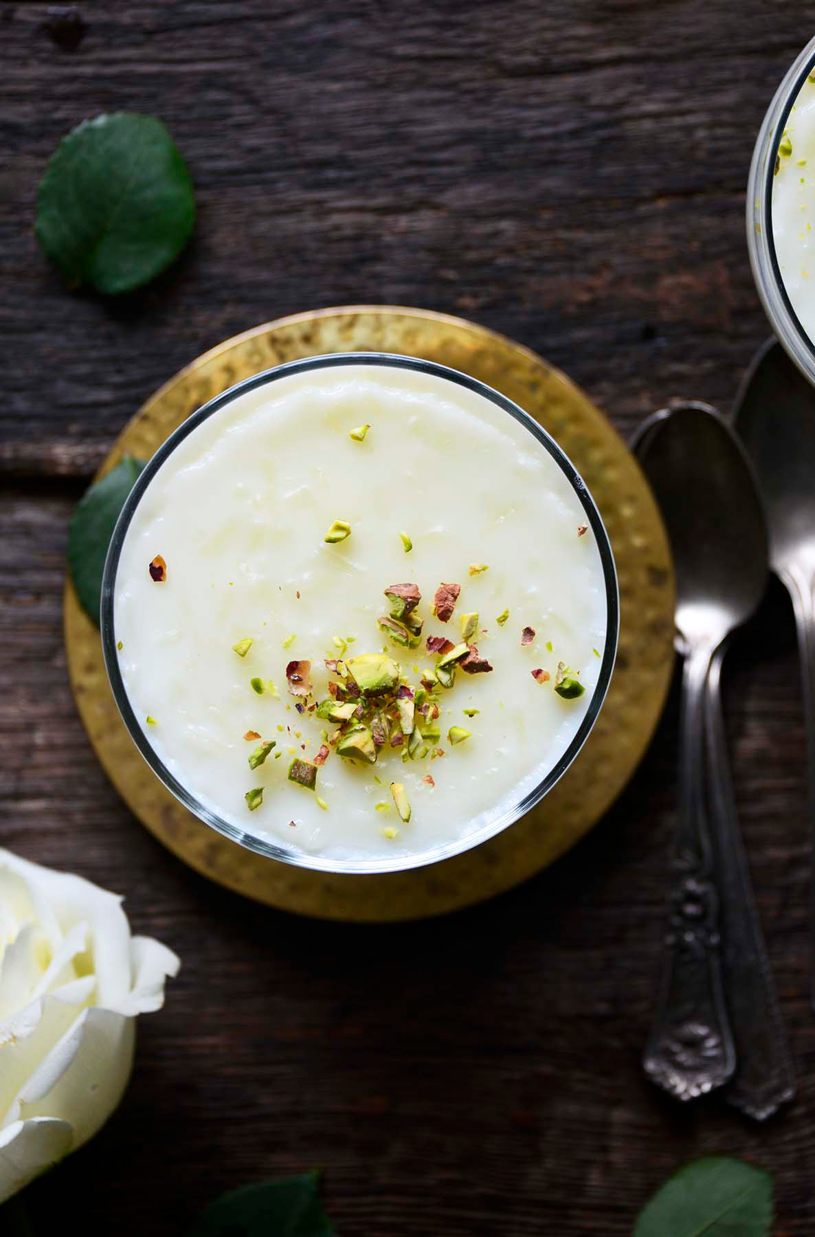 top view of rose water rice pudding with pistachios