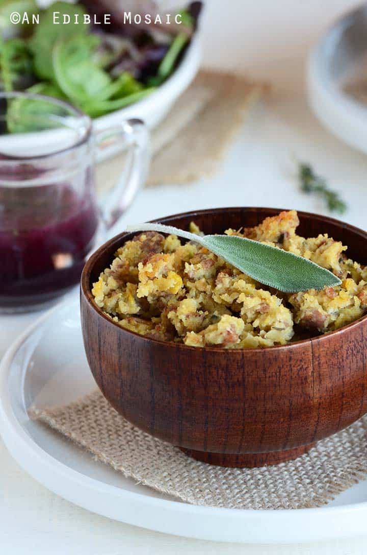 Cornbread Stuffing Recipe with Sausage in Bowl with Fresh Sage