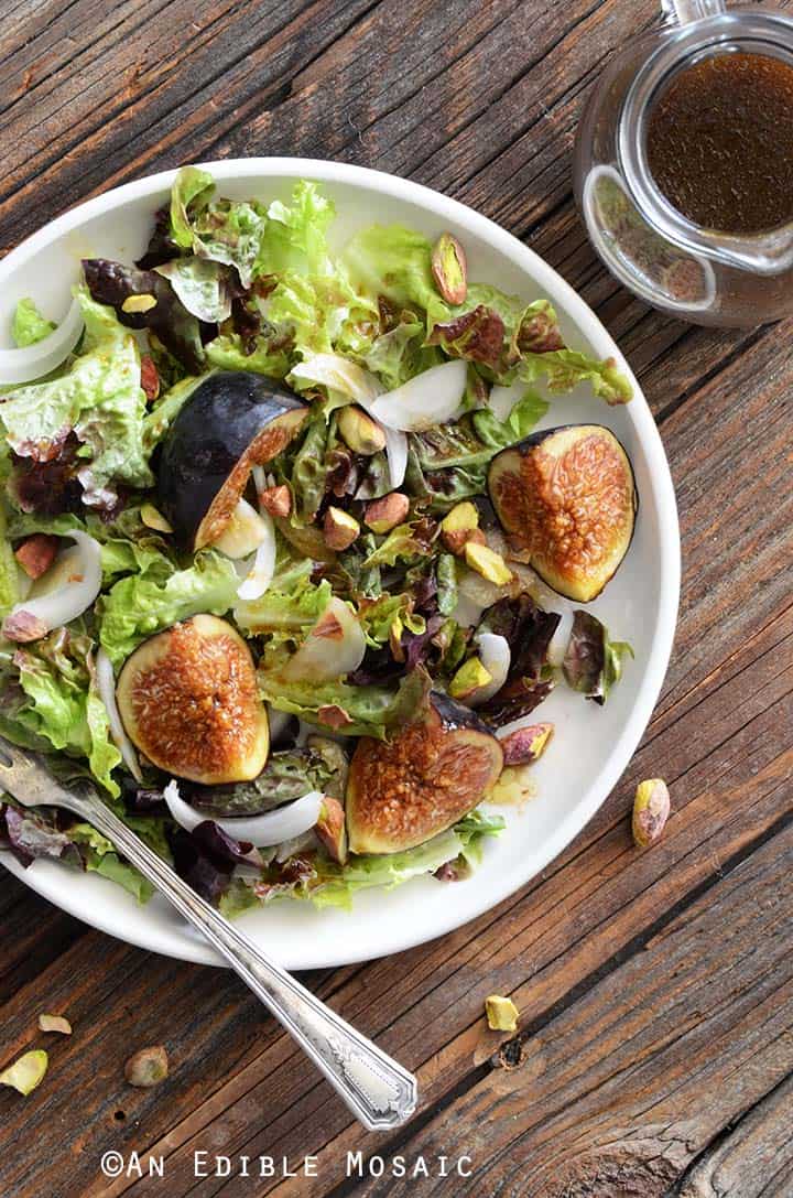 Top View of Fresh Fig Salad Recipe on White Plate on Wooden Table