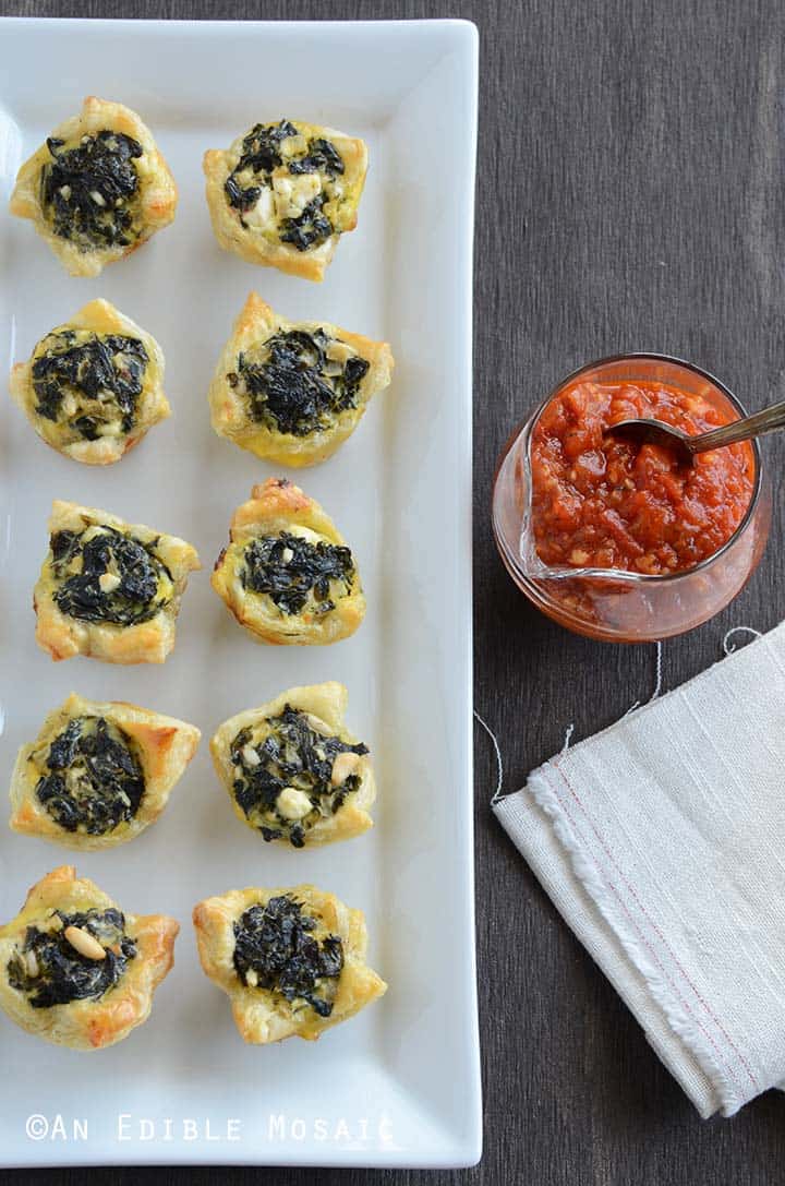 Top View of Spinach Puff Pastry Appetizer on White Platter