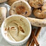 Cinnamon Cream Cheese Dip in White Bowl with Cinnamon Sticks