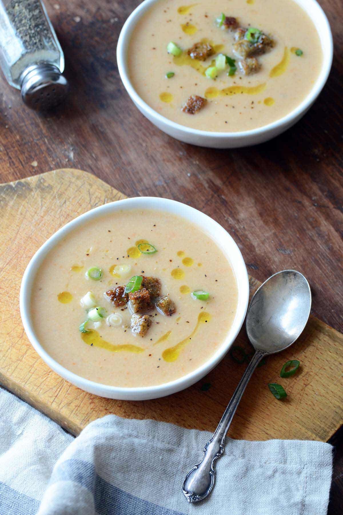 front view of bowl of beer cheese soup with cauliflower