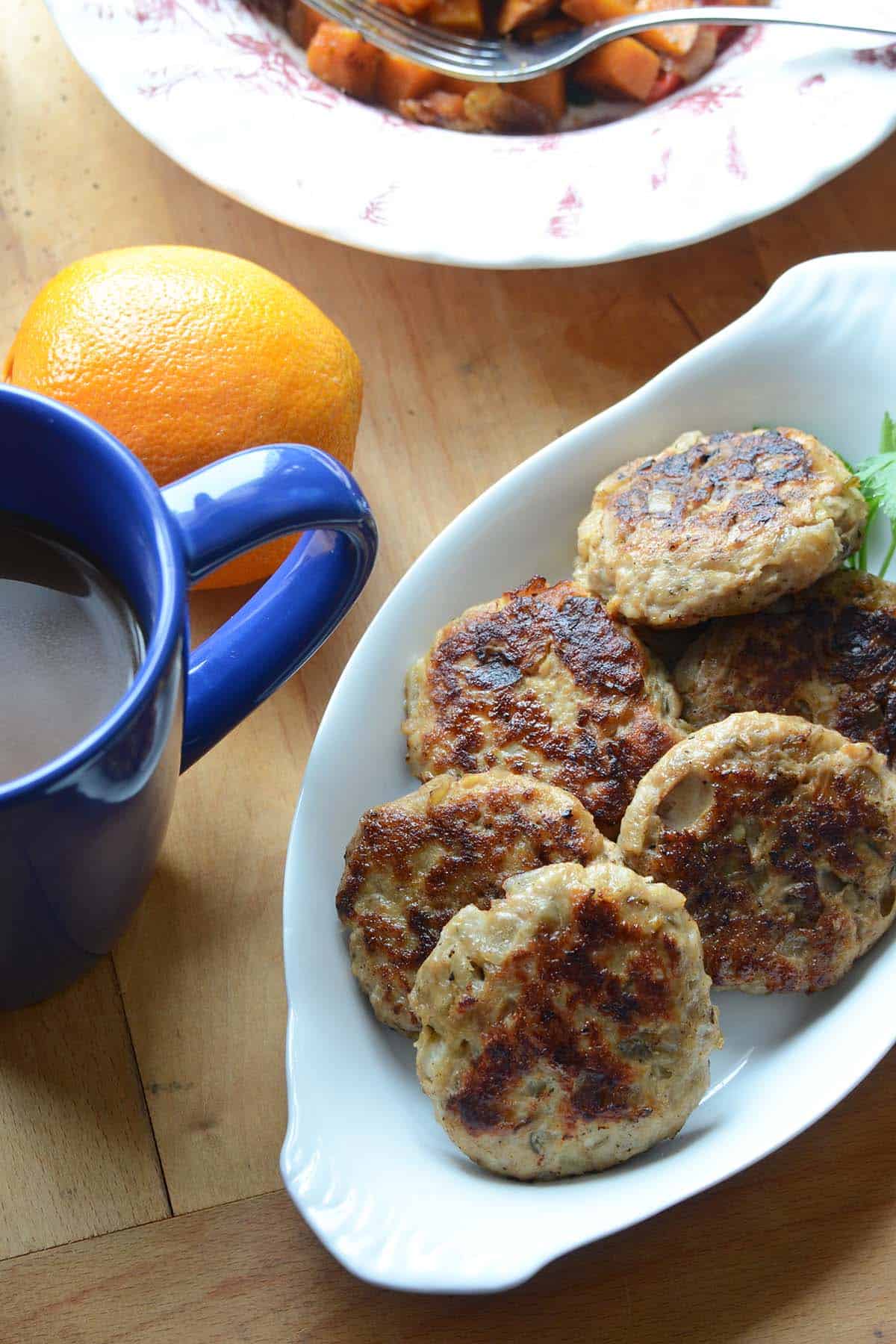 breakfast spread of chicken sausage patties with coffee