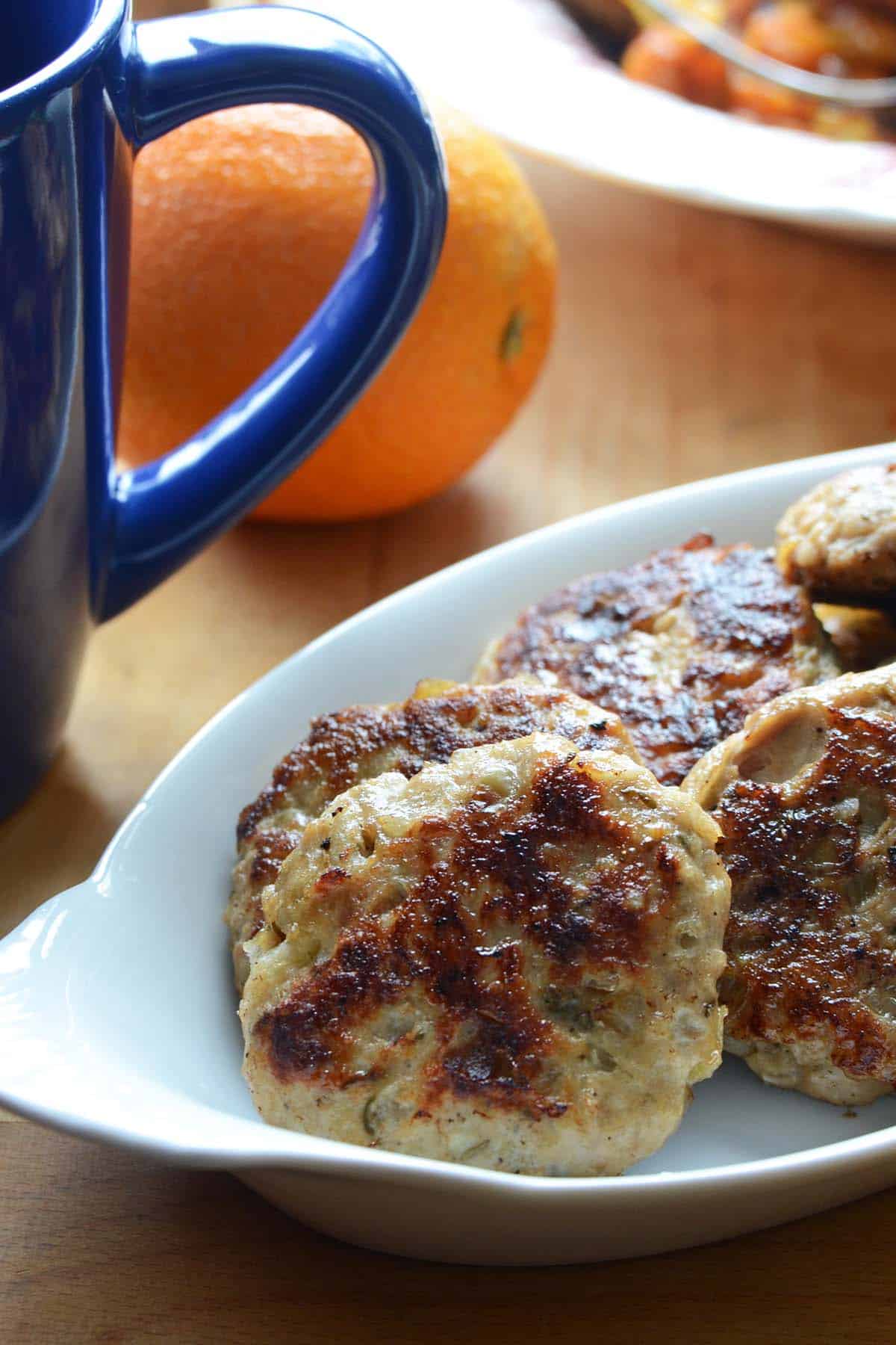 front view of breakfast chicken sausage patty in dish