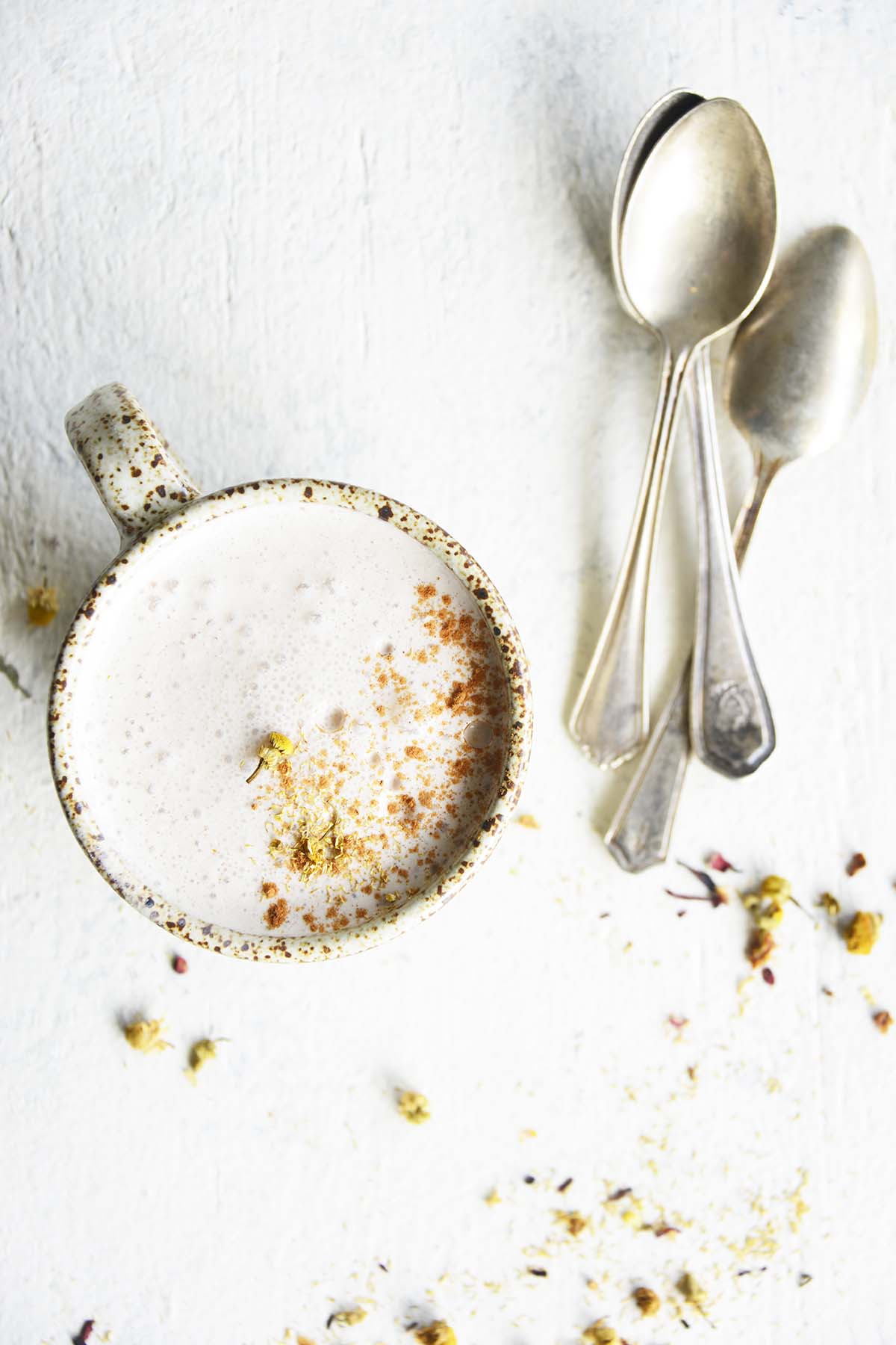 top view of chamomile latte on white table