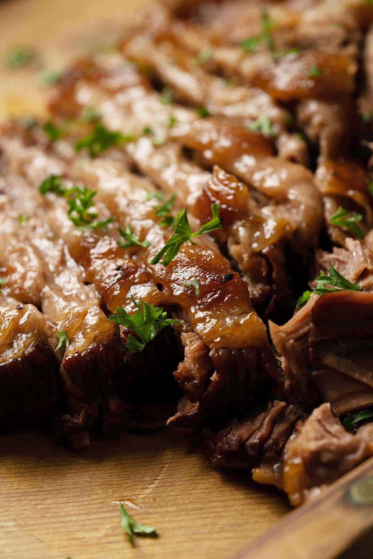 close up front view of slow cooked brisket in oven