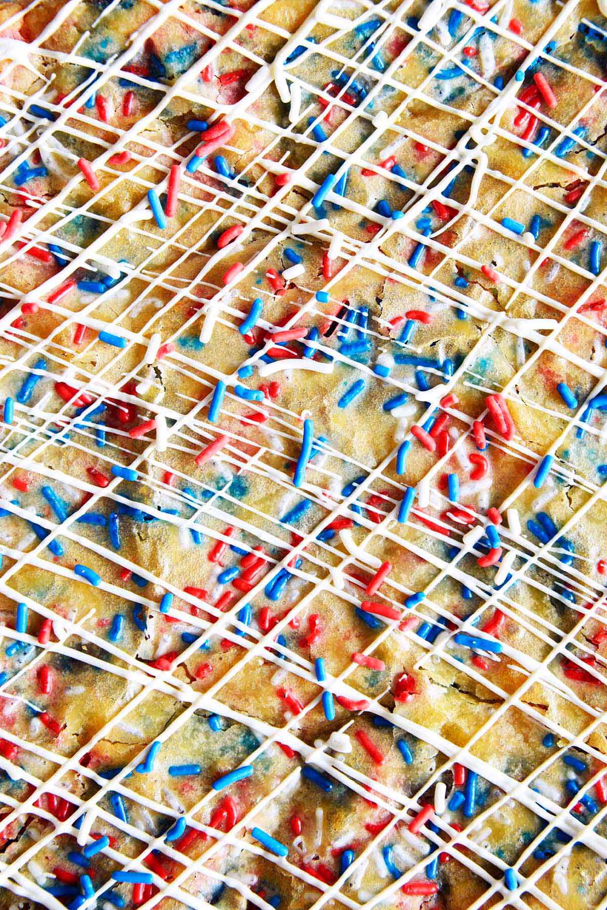 close up top view of patriotic blondies bar cookies before slicing