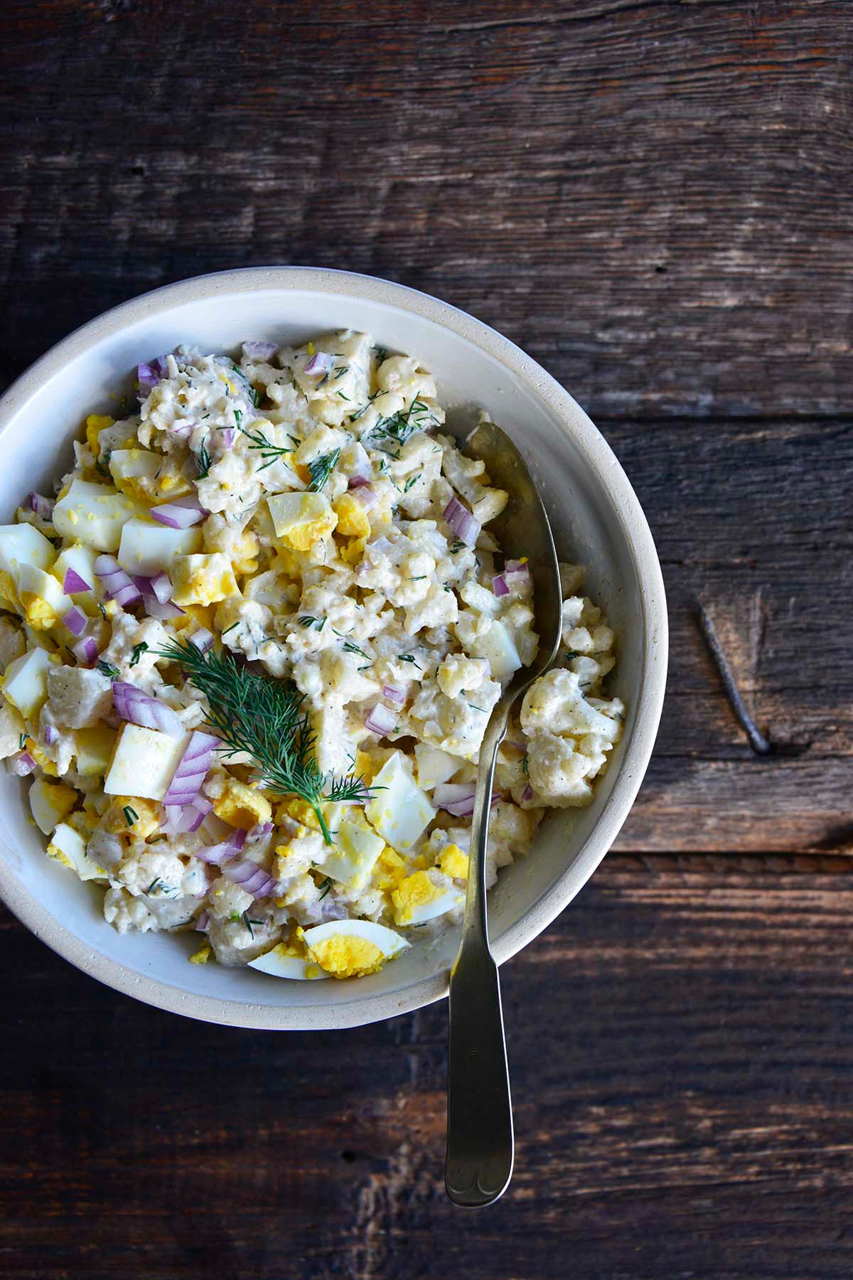 gluten free and low carb style potato salad made with cauliflower