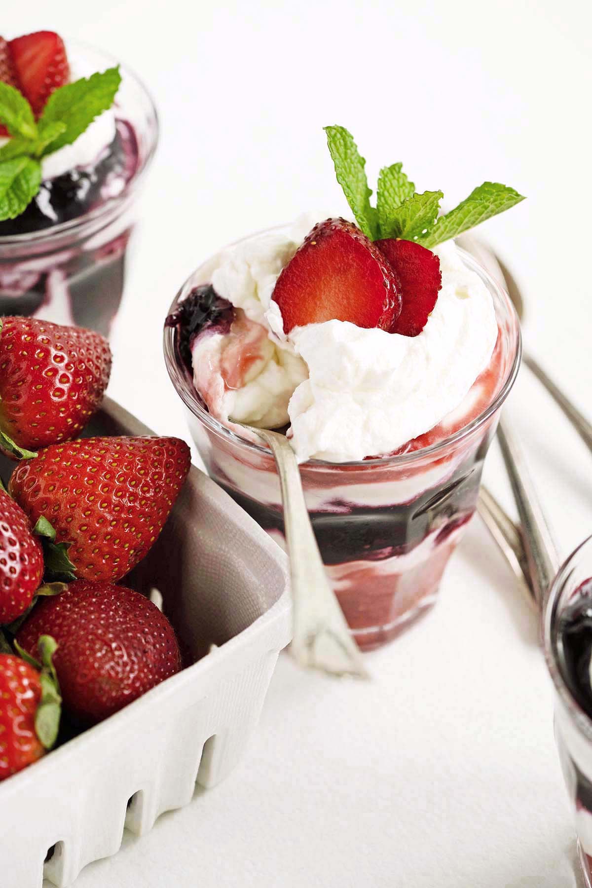 sideview of partially eaten no bake cheesecake mousse with spoon