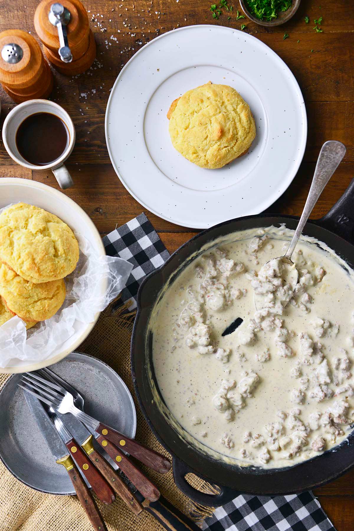 breakfast table with keto biscuits and white sausage gravy