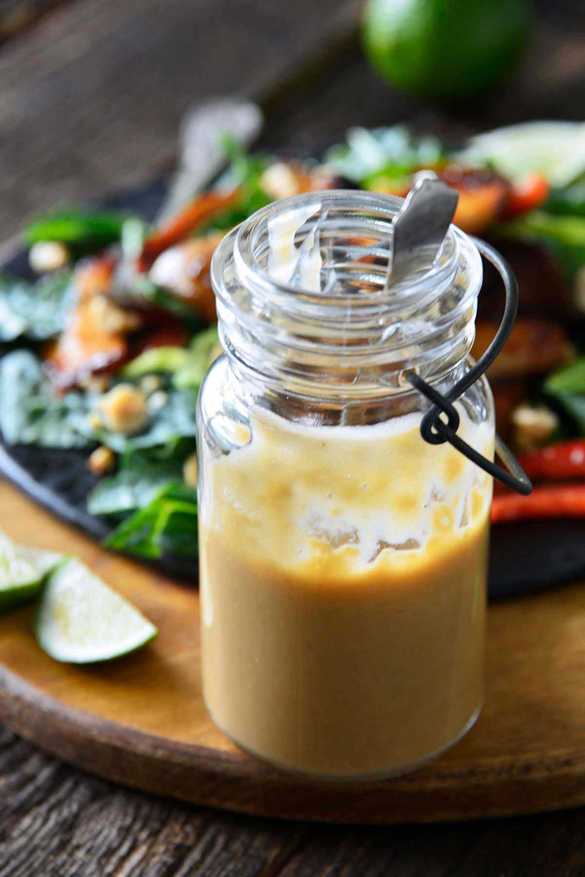 maple tahini salad dressing in vintage glass jar