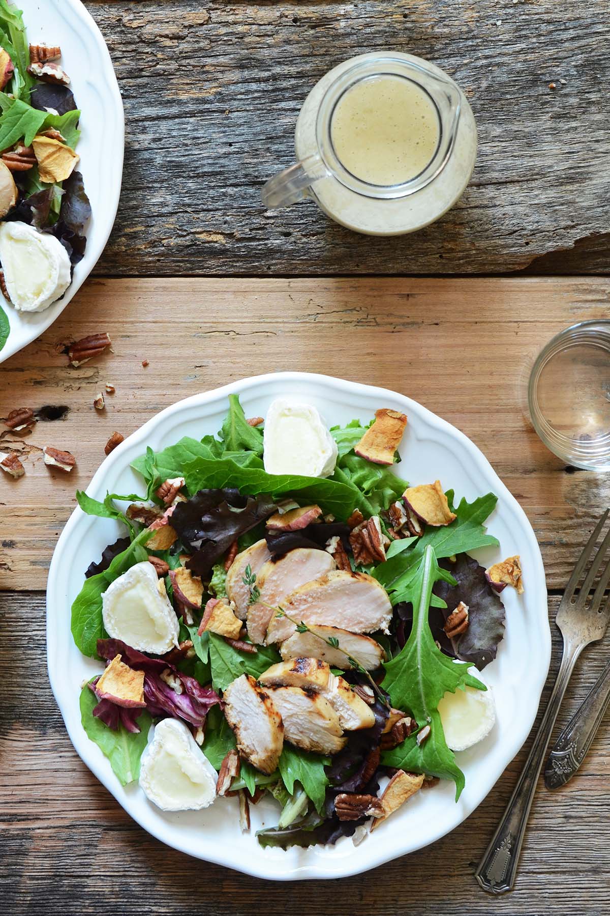 grilled chicken served over salad