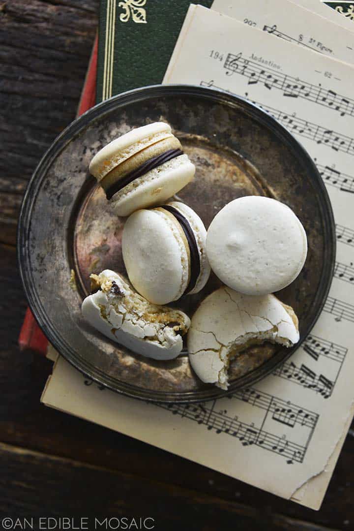 vanilla macarons with chocolate ganache and coffee buttercream